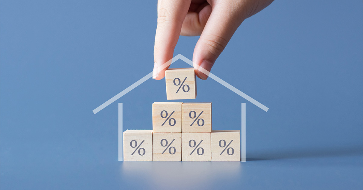 percent blocks stacking up in house shape to show housing interest rates