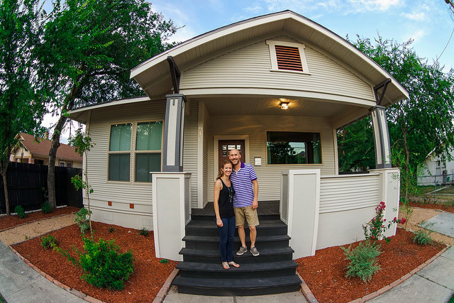 A couple selling their house to an amateur home investor. 